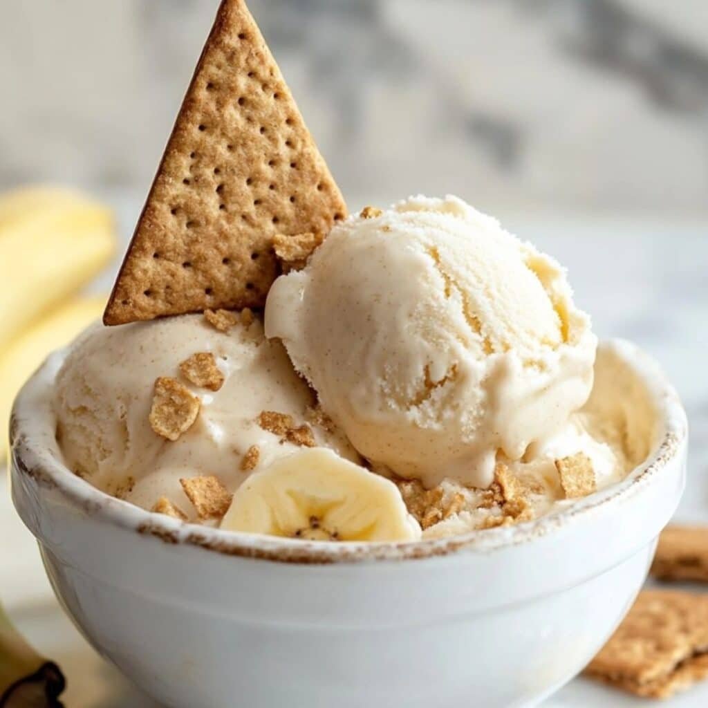 Cottage Cheese Banana Pudding Ice Cream – Creamy scoop with banana slices and graham cracker topping
